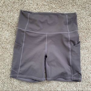 Fabletics purple bike shorts